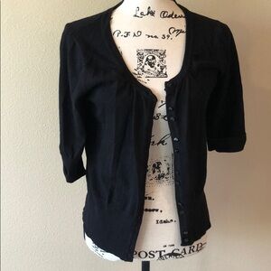 Adorable little black button up sweater